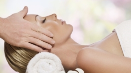 woman relaxing to head massage